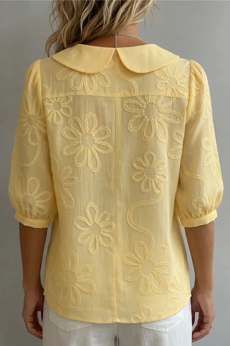 Anne - Elegante blusa con flores bordadas