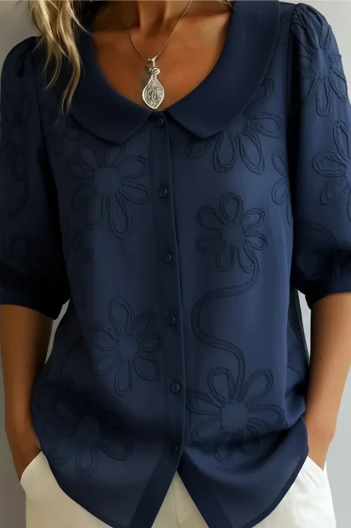 Anne - Elegante blusa con flores bordadas